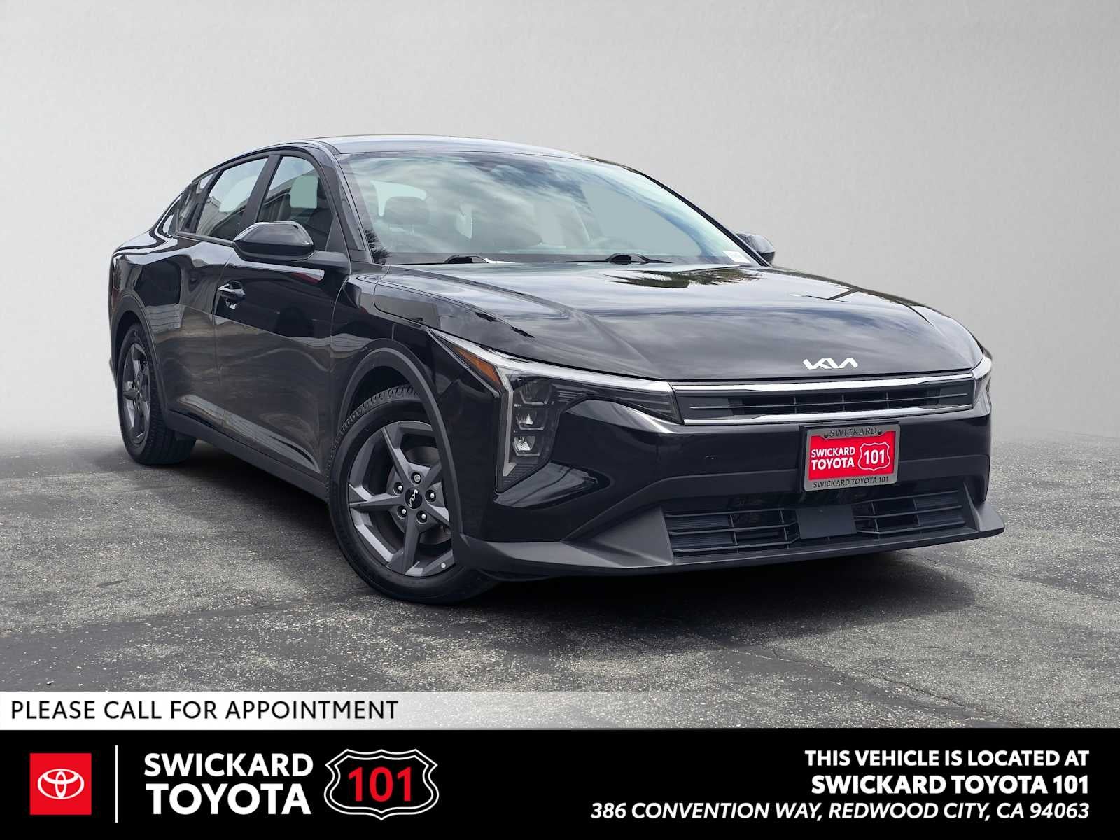 2025 Kia K4 LXS in Aurora Black Pearl — front three-quarter view