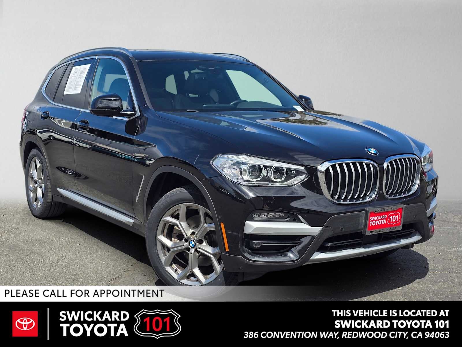 2021 BMW X3 xDrive30i xDrive30i in Black Sapphire Metallic — front three-quarter view