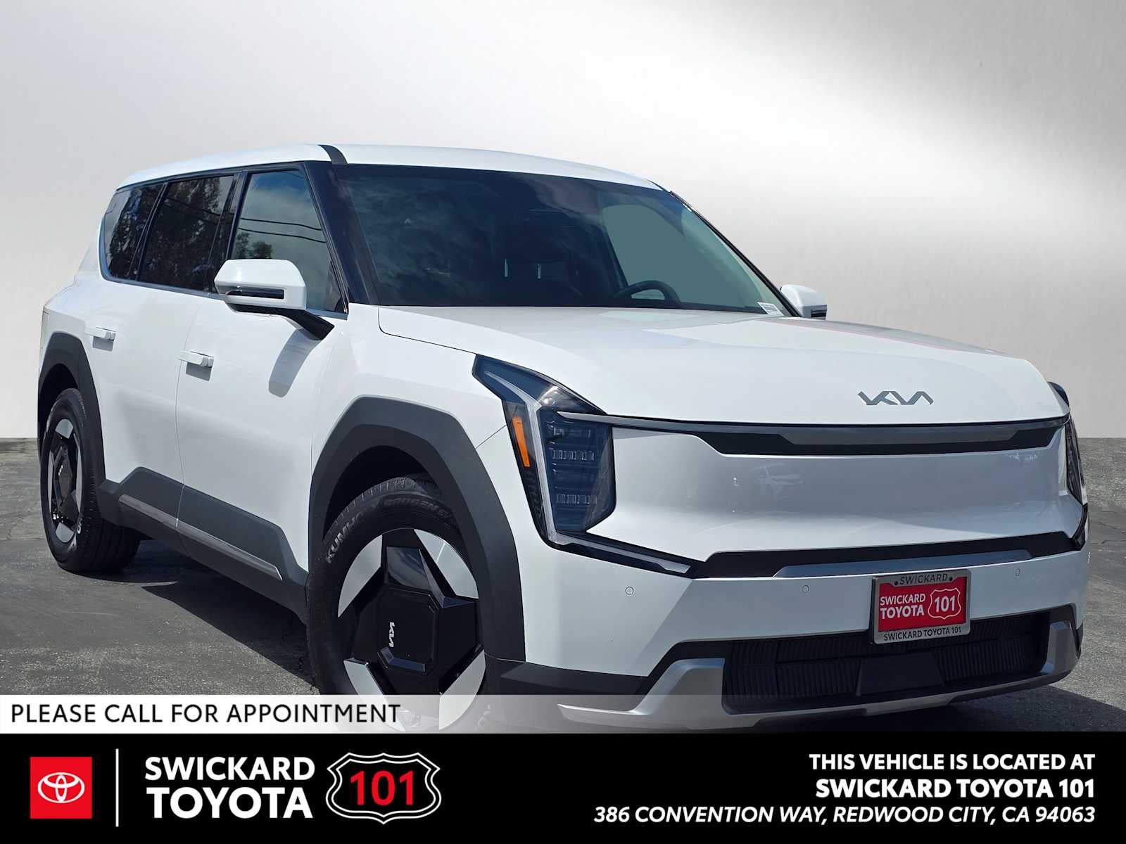2026 Kia EV9 Light Short Range in Glacial White Pearl — front three-quarter view