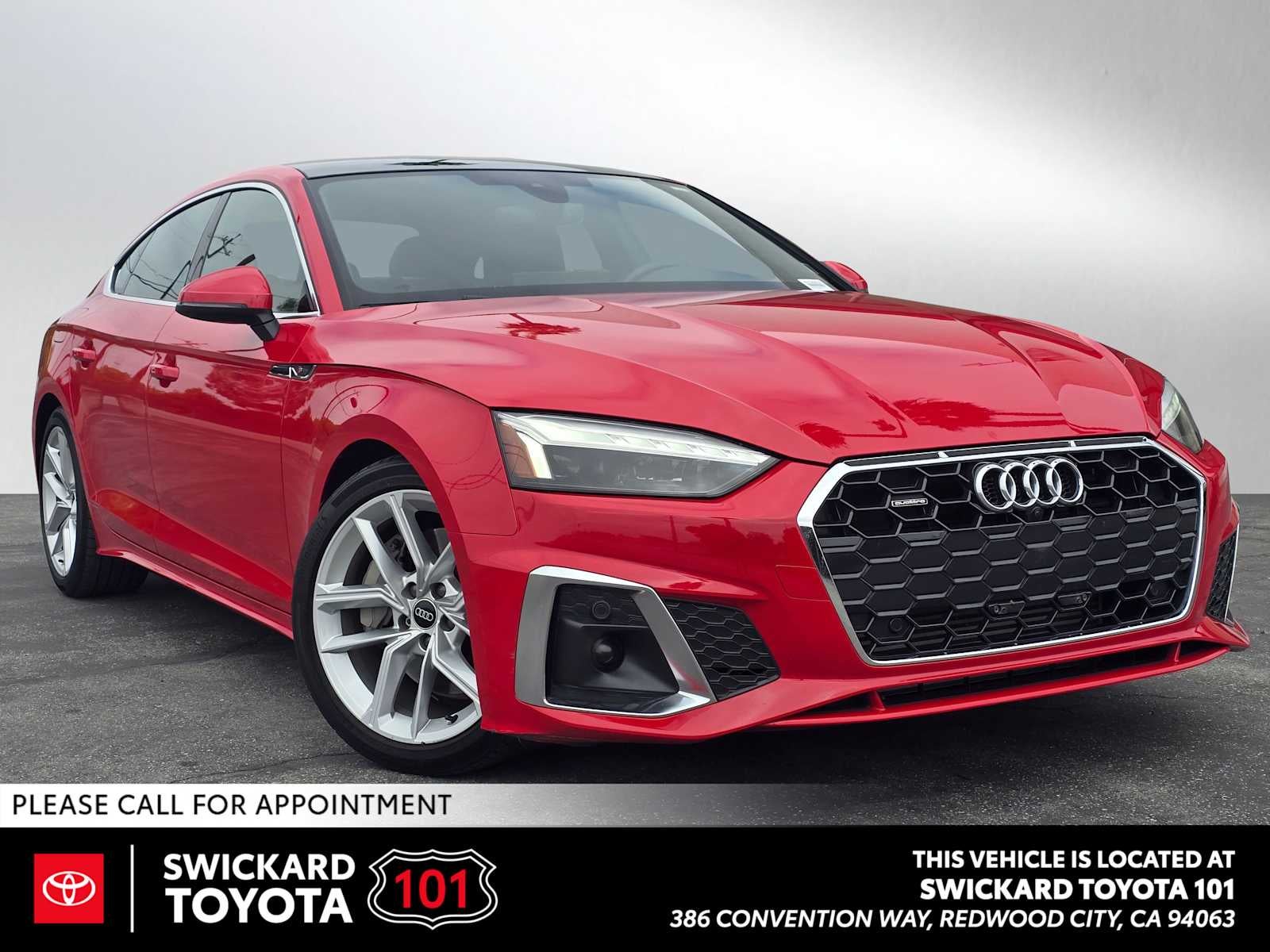 2024 Audi A5 Sportback S line Premium Plus in Progressive Red Metallic — front three-quarter view