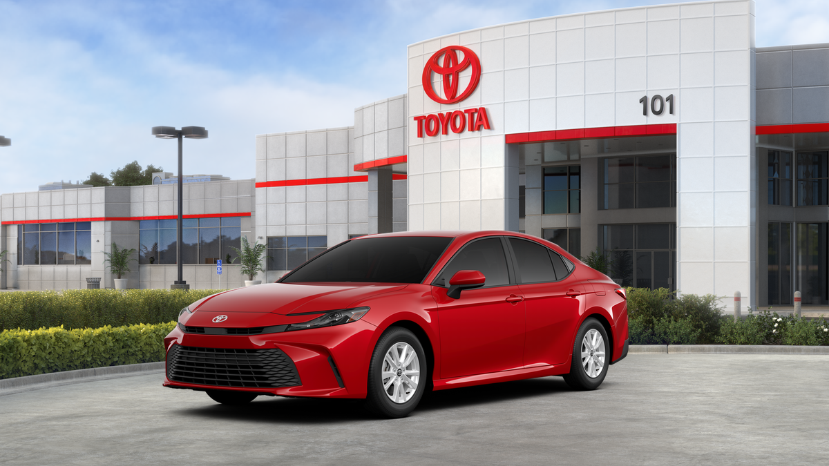 2026 Toyota Camry LE in Supersonic Red <a role='button' class='viewDgDisclaimersButton' data-toggle='modal'...